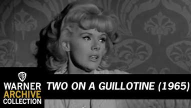 Trailer HD | Two On a Guillotine | Warner Archive poster