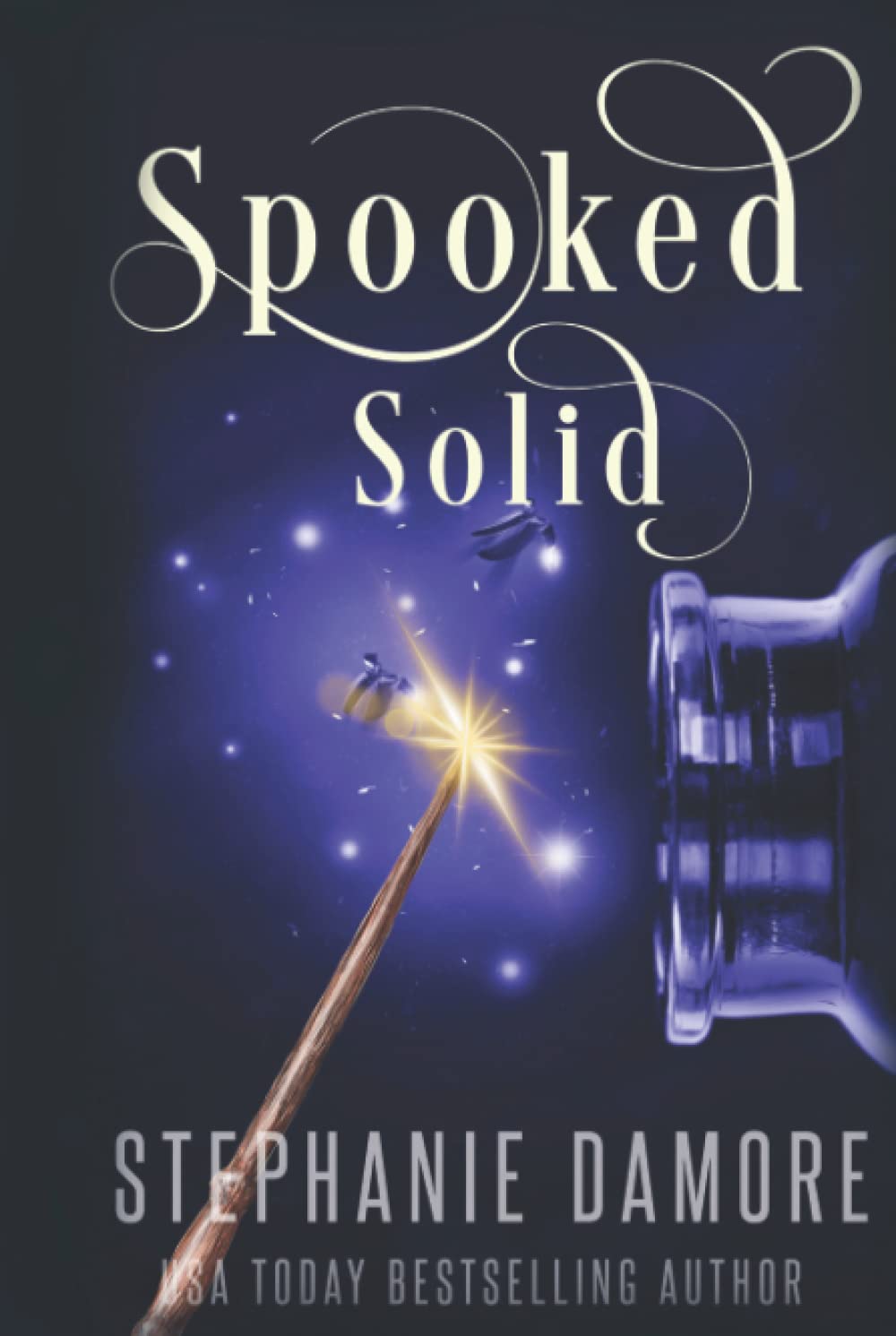 Spooked Solid: A Paranormal Cozy Mystery (Mystic Inn Mystery) poster