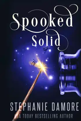Spooked Solid: A Paranormal Cozy Mystery (Mystic Inn Mystery) poster