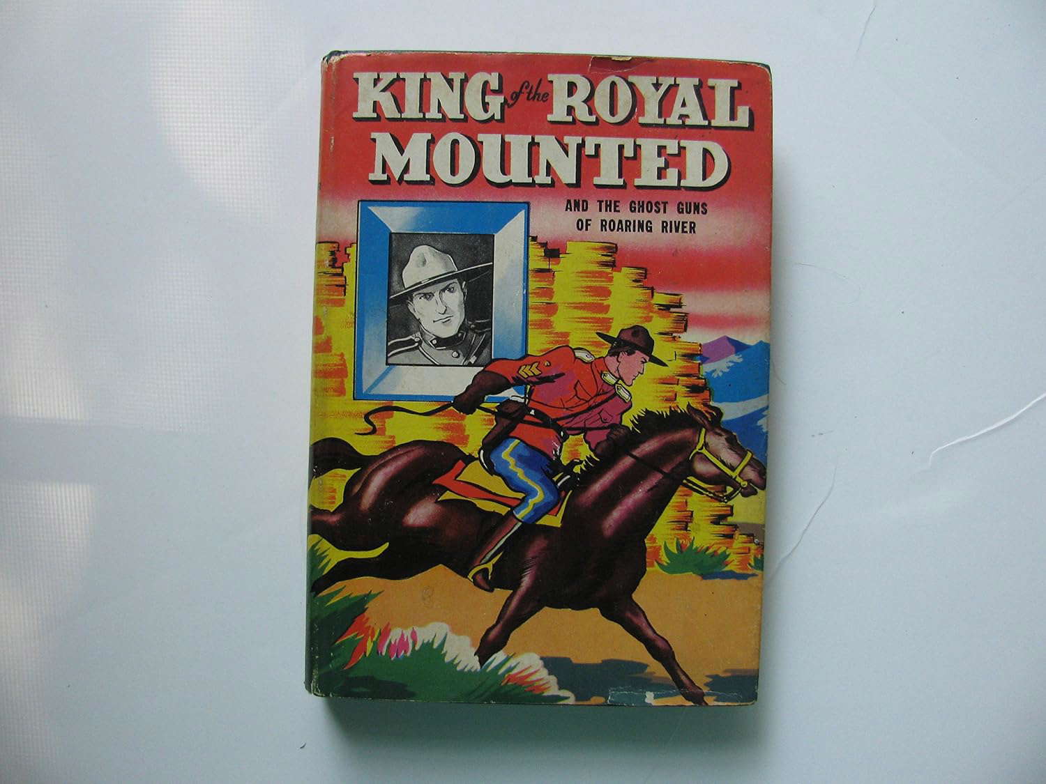 KING OF THE ROYAL MOUNTED and The Ghost Guns of Roaring River poster