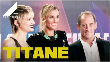 On the Red Carpet with TITANE poster