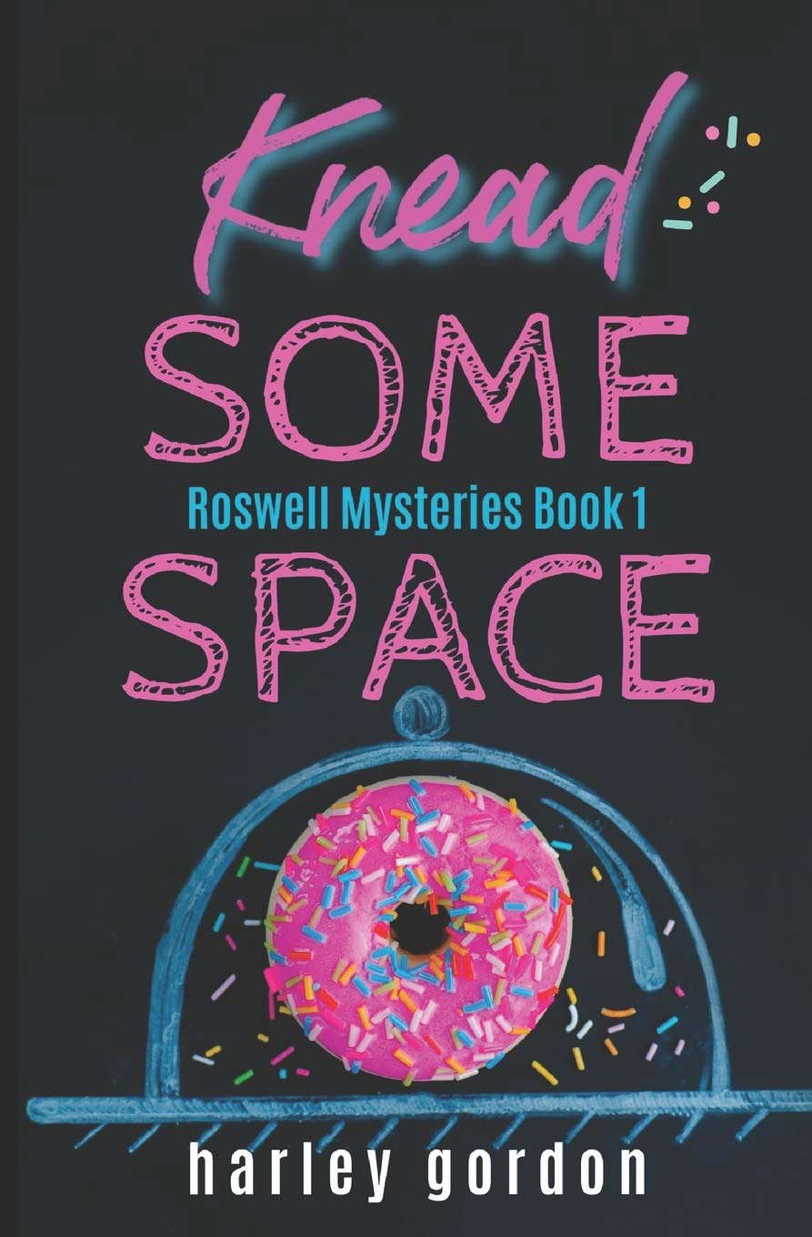 Knead Some Space: A Paranormal Cozy Mystery (Roswell Mysteries) poster