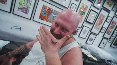 Free Tattoos on World Smile Day poster