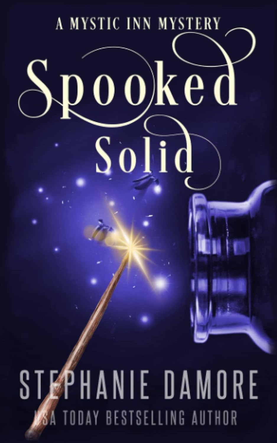 Spooked Solid: A Paranormal Cozy Mystery (Mystic Inn Mystery) poster
